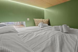 Postel nebo postele na pokoji v ubytování Superbe appartement avec piscine + 31 fotografií