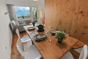 Posezení v ubytování Superbe appartement avec piscine