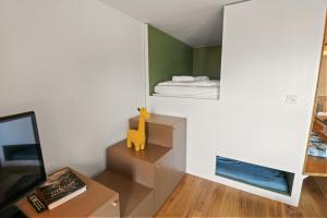TV a/nebo společenská místnost v ubytování Superbe appartement avec piscine