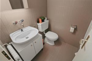 Koupelna v ubytování Superbe appartement avec piscine