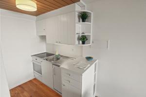 Kuchyň nebo kuchyňský kout v ubytování Superbe appartement avec piscine