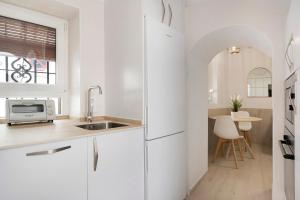Kuchyňa alebo kuchynka v ubytovaní Apartamento Cobarrubias