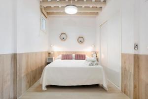 Posteľ alebo postele v izbe v ubytovaní Apartamento Cobarrubias