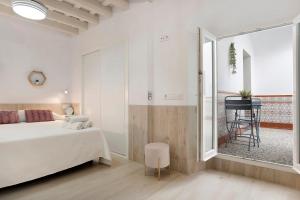 Posteľ alebo postele v izbe v ubytovaní Apartamento Cobarrubias