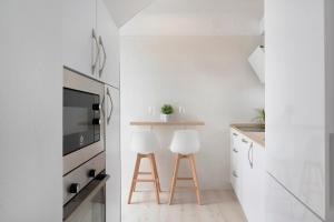 Kuchyňa alebo kuchynka v ubytovaní Apartamento Cobarrubias + 13 fotografií