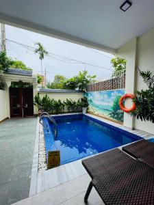 Πισίνα στο ή κοντά στο HoiAn Déja Blue I - Private villa with 4brs and pool
