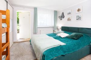 Postel nebo postele na pokoji v ubytování Zacisze Sosnowe + 35 fotografií