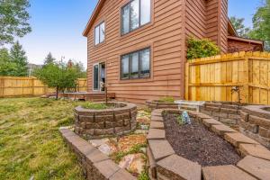 a house with a garden in front of it at Mountain Vistas in Silverthorne