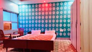 Krevet ili kreveti u jedinici u objektu Hotel Nishi Pvt ltd