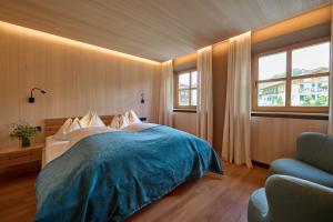 Posteľ alebo postele v izbe v ubytovaní Hotel Mohnenfluh