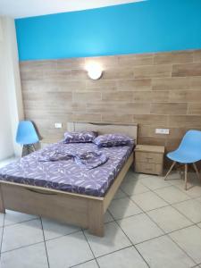 Postel nebo postele na pokoji v ubytování GCM 1 ROOMS kentro k parking