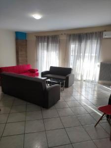 Posezení v ubytování GCM 1 ROOMS kentro k parking