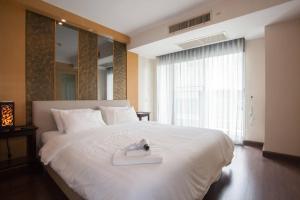 Postel nebo postele na pokoji v ubytování 4D-Lovely 25 Bedrooms Bkk Downtownbtsmrtboat + 34 fotografií