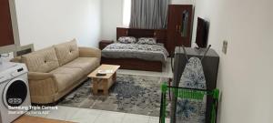 Posezení v ubytování Apartment in Ajman,Studio flat