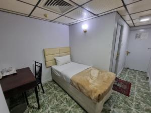 Postel nebo postele na pokoji v ubytování West Hotel
