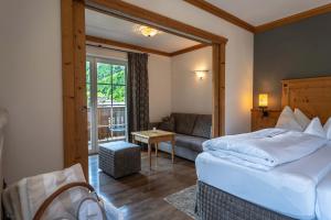 Postel nebo postele na pokoji v ubytování Hotel Kaprunerhof + 37 fotografií