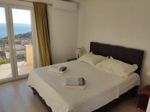 Posteľ alebo postele v izbe v ubytovaní Apartments Marija Max + 36 fotografií