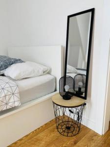 Cama o camas de una habitación en Nowe 3 pokojowe mieszkanie z dużym tarasem