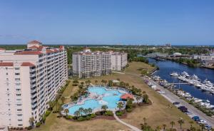 an aerial view of a resort with a pool and a marina at North Tower #802 Condo in Myrtle Beach