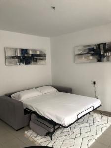 A bed or beds in a room at VEROMA PISOS