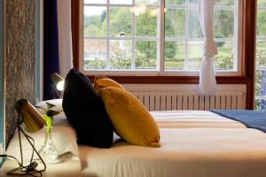 A bed or beds in a room at Luxury Singular Villa Rosa