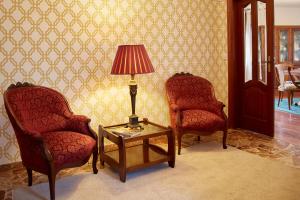 A seating area at Luxury Singular Villa Rosa