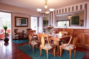 A seating area at Luxury Singular Villa Rosa