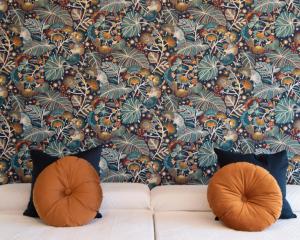 A bed or beds in a room at Luxury Singular Villa Rosa