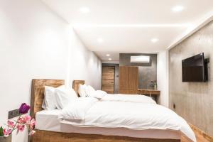 Voodi või voodid majutusasutuse 9ine Thamel Hotel toas