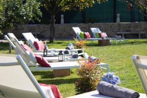 A garden outside Luxury Singular Villa Rosa