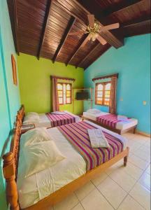 Postel nebo postele na pokoji v ubytování Hotel Rosalila + 37 fotografií