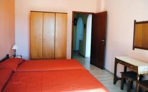 Postel nebo postele na pokoji v ubytování Hotel Olga