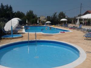 Bazén v ubytování Hotel Olga nebo v jeho okolí