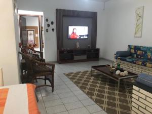 TV i/ili multimedijalni sistem u objektu Apartamento com 3 quartos em Itagua