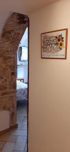 Postel nebo postele na pokoji v ubytování La grotta di NiMa