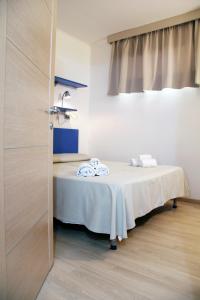 Кровать или кровати в номере Residence Mediterraneo