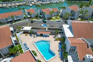 an aerial view of a resort with a swimming pool at #231 F Madeira Beach Yacht Club in St. Pete Beach