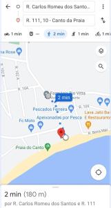 a screenshot of a cell phone with a map at Apartamento amplo pé na areia - Itapema 180m da Praia in Itapema