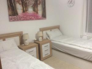 Postel nebo postele na pokoji v ubytování Precioso duplex con piscina y parking