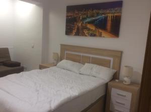 Postel nebo postele na pokoji v ubytování Precioso duplex con piscina y parking + 8 fotografií