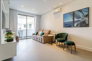 Гостиная зона в WI-FI 200MB | 350m da Praia de Jurerê #JA07