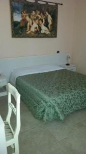 Cama o camas de una habitación en B&B Manzoni Resort