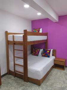 Postel nebo postele na pokoji v ubytování Itza Hotel Akumal