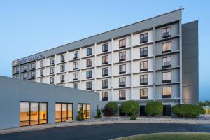 a rendering of the front of a hotel at Comfort Inn & Suites Buffalo Airport in Buffalo