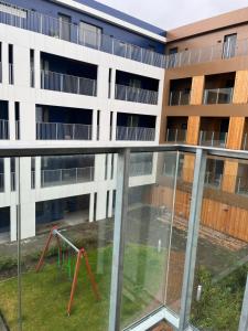 an empty courtyard in an apartment building with a playground at Hidden Gem in Downtown Reykjavík in Reykjavík