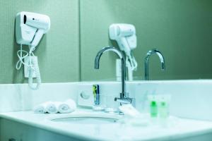 Um banheiro em Holiday Inn Belo Horizonte Savassi by IHG