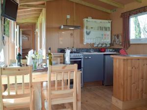 Kuchyň nebo kuchyňský kout v ubytování Butterfly Lodge