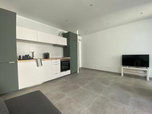 Kuchyň nebo kuchyňský kout v ubytování Apartamento T1 Cabanas de Tavira - Cantinho do Haduindo