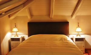 Ένα ή περισσότερα κρεβάτια σε δωμάτιο στο Guest House Ioanna Arachova