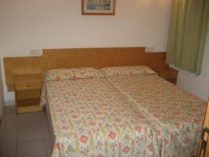 Cama o camas de una habitación en Holiday homes Bonamar